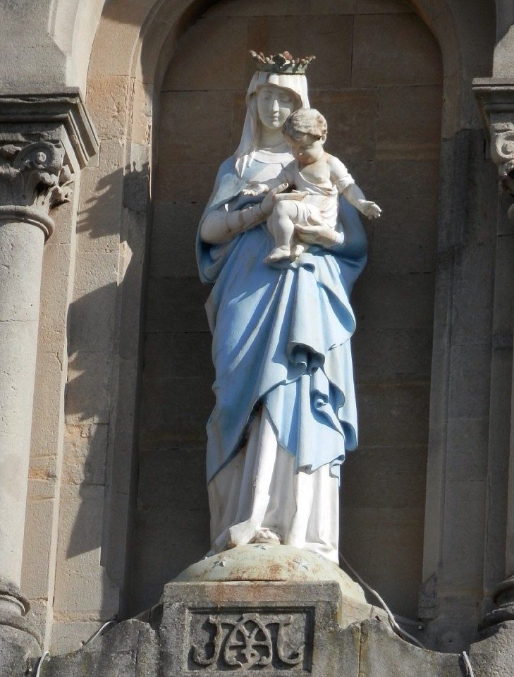 The carved statue of Our Lady in its outdoor niche on the west front